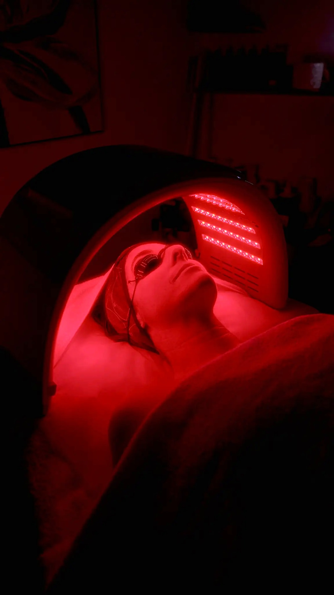 Client receiving LED light therapy at LH Skincare